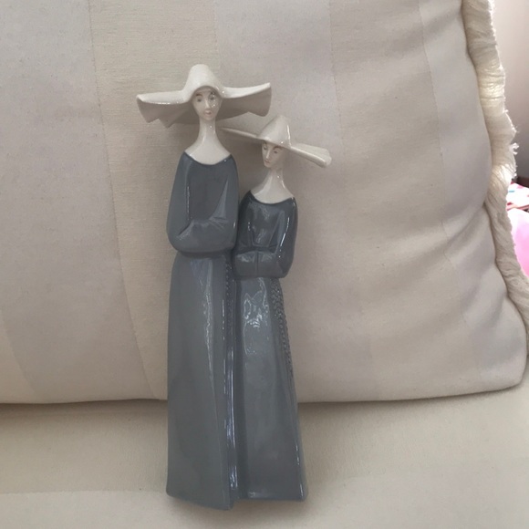 101/2 inch porcelain Nuns statue